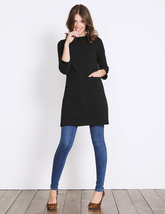 Leopard Pumps Outfits: This combo of a black sweater dress and blue skinny jeans is pulled together and yet it's relaxed enough and ready for anything. And if you wish to effortlessly rev up your outfit with footwear, add a pair of leopard pumps to your outfit.