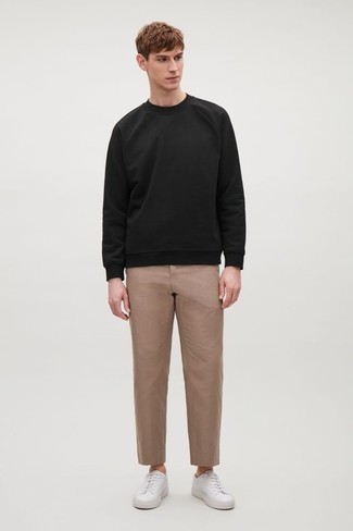 Black Sweater Outfits For Men: Up your laid-back look a notch by opting for a black sweater and khaki chinos. White leather low top sneakers will inject a sense of polish into an otherwise straightforward look.