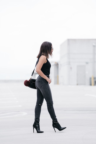 Black Leather Ankle Boots Outfits: For comfort dressing with a modernized spin, opt for a black tank and charcoal ripped skinny jeans. For footwear, you can stick to the classic route with black leather ankle boots.