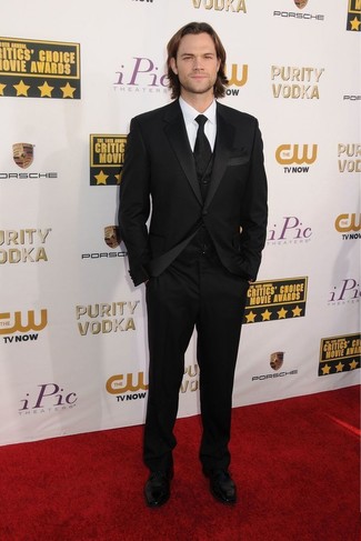 Jared Padalecki wearing Black Three Piece Suit, White Dress Shirt, Black Leather Derby Shoes, Black Tie