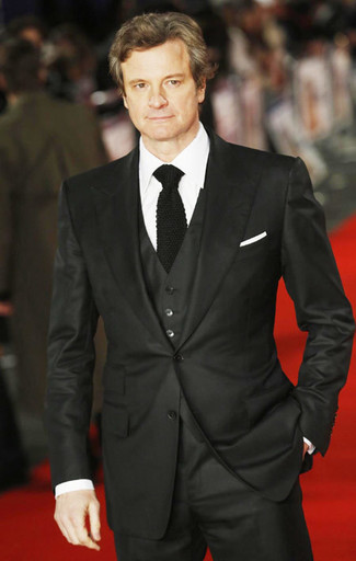 Colin Firth wearing Black Three Piece Suit, White Dress Shirt, Black Knit Tie, White Pocket Square