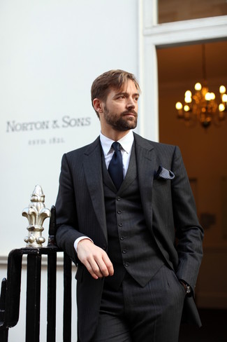 Patrick Grant wearing Black Vertical Striped Three Piece Suit, White Dress Shirt, Navy Tie, Black and White Polka Dot Pocket Square
