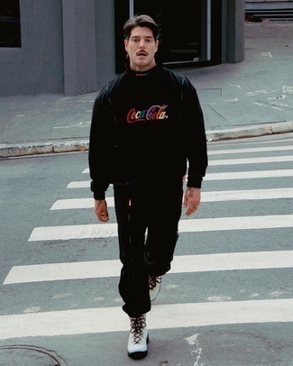 Black Track Suit Outfits For Men: Consider wearing a black track suit for an edgy getup that's easy to put together. And if you need to immediately smarten up this getup with footwear, introduce a pair of white canvas work boots to the mix.