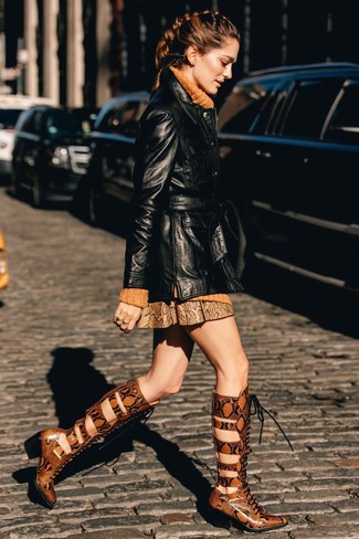 Mustard Knit Turtleneck Outfits For Women: A mustard knit turtleneck and a brown snake leather mini skirt are a cool outfit formula to keep in your sartorial arsenal. Complement this look with tobacco snake leather knee high boots to make the ensemble slightly more refined.