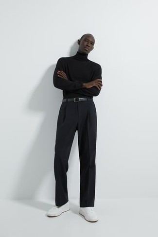 1200+ Casual Outfits For Men: A black turtleneck and black chinos are a good combo to have in your off-duty repertoire. White canvas low top sneakers will give a touch of stylish nonchalance to an otherwise dressy ensemble.