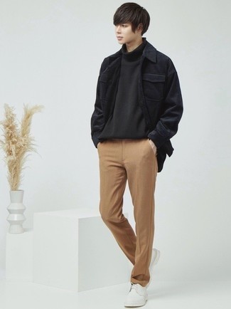 Black Corduroy Long Sleeve Shirt Outfits For Men: To assemble a casual ensemble with a contemporary spin, pair a black corduroy long sleeve shirt with khaki chinos. To give your overall outfit a more elegant feel, why not add white leather derby shoes to your ensemble?