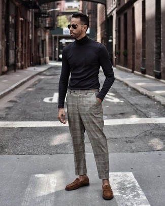 Brown Suede Loafers Outfits For Men: One of the coolest ways for a man to style out a black turtleneck is to pair it with grey plaid chinos in an off-duty outfit. Clueless about how to complement this outfit? Finish off with a pair of brown suede loafers to dress it up.