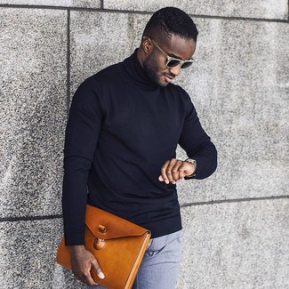 Black Turtleneck Spring Outfits For Men: Irrefutable proof that a black turtleneck and light blue dress pants look awesome when worn together in a classy getup for today's guy. Keep this look in your head come warmer days, and we promise you'll save time getting ready on more than one morning.