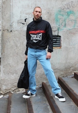 Black Windbreaker Outfits For Men: Why not consider wearing a black windbreaker and light blue jeans? As well as totally comfortable, these two items look cool paired together. The whole look comes together if you complete this outfit with a pair of black and white canvas low top sneakers.