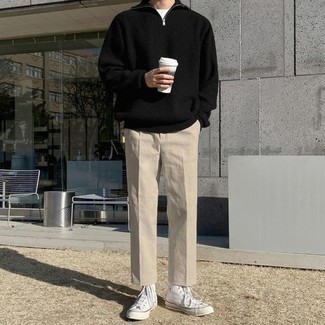 Beige Chinos Outfits: Such items as a black zip neck sweater and beige chinos are an easy way to infuse effortless cool into your day-to-day routine. If you want to immediately dial down your ensemble with one single piece, why not complement this outfit with white canvas high top sneakers?
