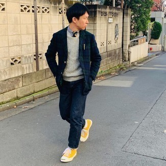 Orange Canvas Low Top Sneakers Outfits For Men: Why not choose a navy and green plaid blazer and navy jeans? These two items are super functional and look awesome when paired together. To give this getup a more laid-back touch, introduce orange canvas low top sneakers to the mix.
