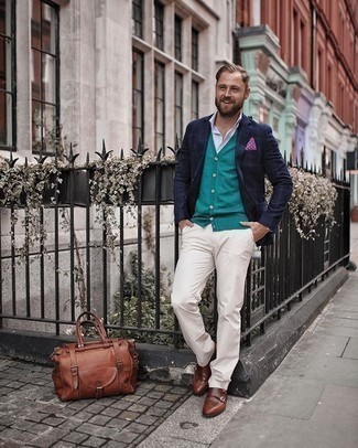 Olive Cardigan Outfits For Men: An olive cardigan and white chinos paired together are the perfect combo for those who prefer off-duty styles. Rounding off with a pair of brown leather double monks is a guaranteed way to add some extra zing to this look.
