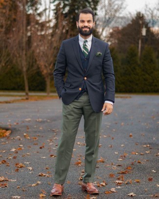 Navy Cardigan Outfits For Men: Putting together a navy cardigan with olive dress pants is an on-point option for a dapper and classy ensemble. Introduce a pair of brown leather loafers to the equation to tie the whole thing together.