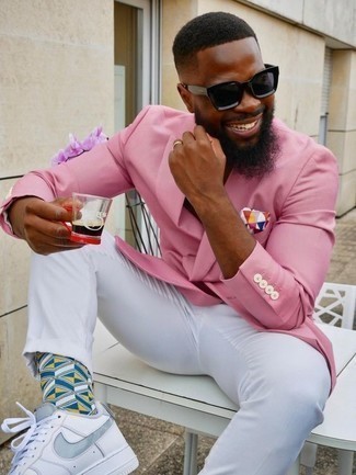 Multi colored Print Socks Outfits For Men: Rock a pink blazer with multi colored print socks for a casual getup. For a dressier touch, why not grab a pair of white leather low top sneakers?
