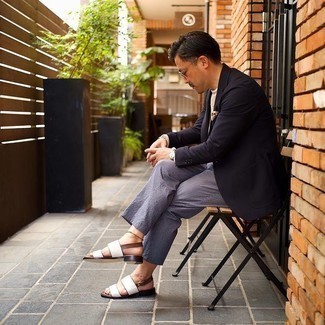 White Sandals Outfits For Men: This combo of a black blazer and light blue vertical striped seersucker chinos is a must-try effortlessly polished outfit for today's gentleman. Introduce white sandals to the equation to keep the outfit fresh.