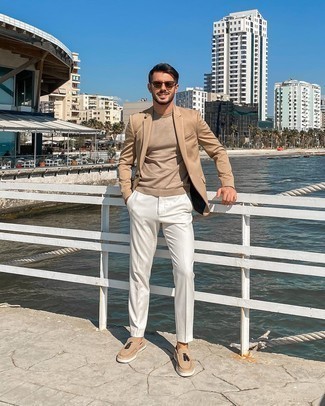 Tan Crew-neck Sweater Outfits For Men: You'll be surprised at how easy it is for any man to throw together this off-duty outfit. Just a tan crew-neck sweater and white chinos. Avoid looking too casual by finishing with tan suede tassel loafers.