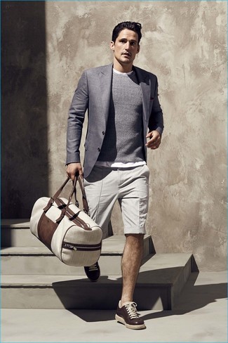 Grey Blazer Warm Weather Outfits For Men: Consider teaming a grey blazer with beige shorts for a neat sophisticated outfit. To infuse a more relaxed aesthetic into this getup, finish with dark brown leather low top sneakers.