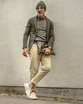 Olive Leather Zip Pouch Outfits For Men: This is irrefutable proof that an olive wool blazer and an olive leather zip pouch are amazing when paired together in a bold casual getup. Our favorite of a great number of ways to complete this ensemble is white canvas low top sneakers.