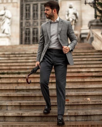 Grey Plaid Blazer Outfits For Men: Opt for a grey plaid blazer and charcoal dress pants for a stylish and sophisticated look. We're loving how this whole getup comes together thanks to black leather tassel loafers.