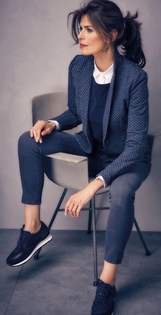 White Dress Shirt Outfits For Women After 40: Marrying a white dress shirt with navy skinny jeans is an awesome choice for a casually stylish look. If you need to immediately dial down your look with one item, why not introduce black suede low top sneakers to the mix?