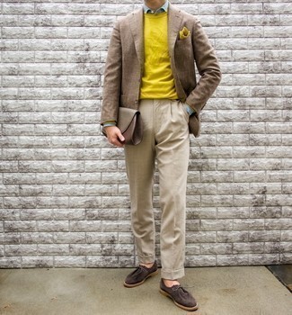 Mustard Crew-neck Sweater Outfits For Men: Marrying a mustard crew-neck sweater and beige dress pants is a guaranteed way to breathe style into your day-to-day fashion mix. A pair of dark brown suede desert boots adds a new dimension to an otherwise all-too-safe ensemble.