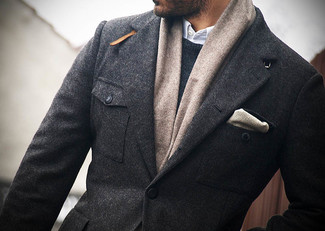 Grey Blazer Chill Weather Outfits For Men: This pairing of a grey blazer and a charcoal crew-neck sweater will cement your expertise in menswear styling.