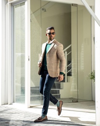 Tan Blazer Outfits For Men: If you're facing a sartorial situation where comfort is a must, this combo of a tan blazer and navy jeans is a winner. To bring some extra definition to your getup, complete your look with a pair of dark brown leather tassel loafers.