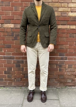 Mustard Crew-neck Sweater Outfits For Men: To pull together an off-duty look with a modern take, you can rock a mustard crew-neck sweater and white jeans. A pair of dark brown leather desert boots is a savvy pick to complete this ensemble.