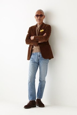 Light Blue Jeans with Brown Blazer Outfits For Men: This pairing of a brown blazer and light blue jeans is a surefire option when you need to look stylish in a flash. Let your outfit coordination skills really shine by complementing this ensemble with a pair of dark brown suede desert boots.