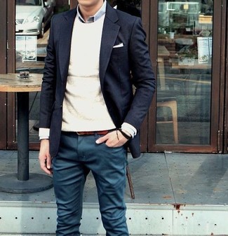 This combination of a black blazer and teal chinos looks pulled together and makes any guy look instantly cooler.