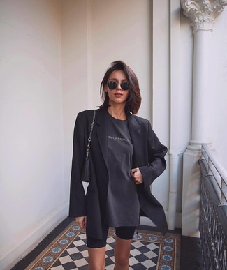 Charcoal Print Crew-neck T-shirt Outfits For Women: You'll be surprised at how easy it is to get dressed this way. Just a charcoal print crew-neck t-shirt and black bike shorts.
