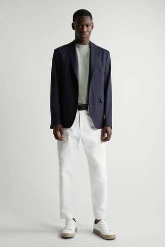 Navy Blazer Outfits For Men: Consider wearing a navy blazer and white chinos and you'll assemble a sleek and classy ensemble. Finishing off with white canvas low top sneakers is a surefire way to inject a touch of stylish nonchalance into your ensemble.
