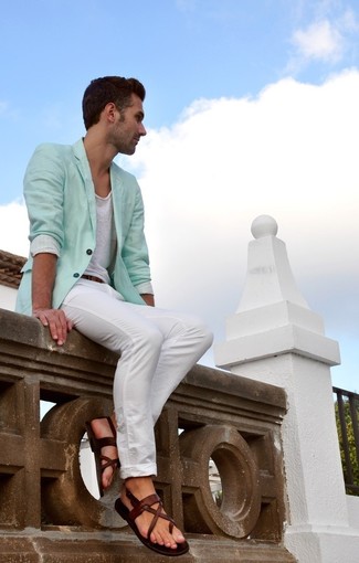 Mint Blazer Outfits For Men: Combining a mint blazer and white chinos is a surefire way to infuse style into your daily arsenal. If you wish to easily dress down your ensemble with a pair of shoes, introduce a pair of brown leather sandals to the equation.