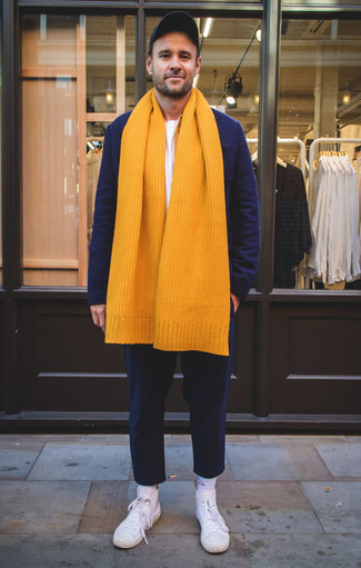 Orange Scarf Outfits For Men: This combination of a navy wool blazer and an orange scarf is hard proof that a safe casual ensemble can still be really interesting. The whole getup comes together wonderfully if you complement your ensemble with a pair of white canvas high top sneakers.