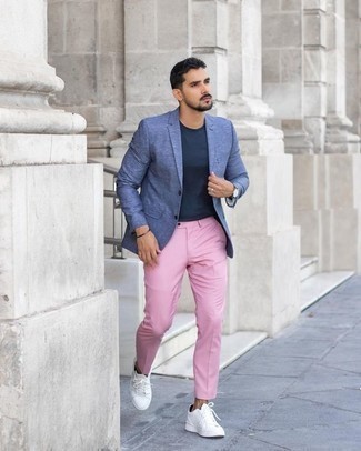 Navy Blazer Casual Outfits For Men: For relaxed sophistication with an alpha male spin, you can dress in a navy blazer and pink chinos. You can get a bit experimental with footwear and add white leather low top sneakers to this outfit.