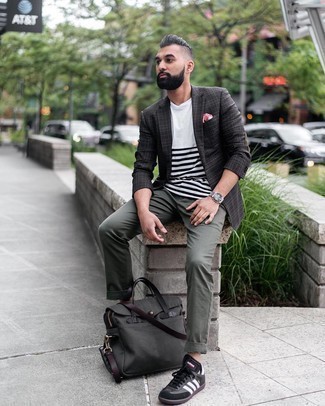 Charcoal Plaid Blazer Outfits For Men: This combo of a charcoal plaid blazer and olive chinos couldn't possibly come across as anything other than incredibly stylish and casually refined. To add an easy-going vibe to your outfit, complete your look with a pair of black and white leather low top sneakers.