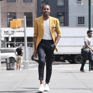 Yellow Blazer Outfits For Men: A yellow blazer and black chinos are a combination that every fashion-forward man should have in his closet. For times when this look is just too much, dress it down by rocking a pair of white canvas low top sneakers.