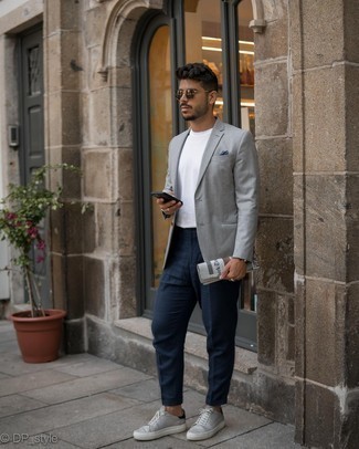 Grey Blazer Outfits For Men: This combo of a grey blazer and navy chinos is a never-failing option when you need to look effortlessly polished but have no time to spare. Grey leather low top sneakers will provide function, but with a fashion effect.