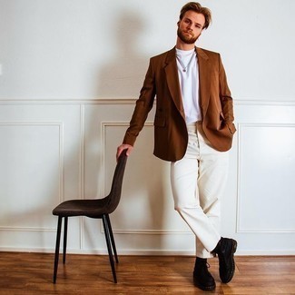 Brown Blazer Outfits For Men: Consider teaming a brown blazer with beige chinos for a neat classy menswear style. To add a bit of flair to this getup, add black leather derby shoes to your outfit.