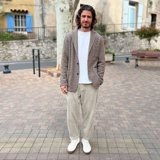 Brown Houndstooth Blazer Outfits For Men: No matter where the day takes you, you'll feel infinitely confident in a brown houndstooth blazer and beige corduroy chinos. To give your look a more casual twist, why not introduce a pair of white canvas low top sneakers to the mix?