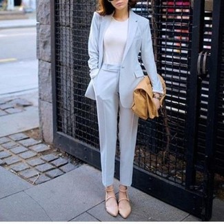 Light Blue Blazer Outfits For Women: A light blue blazer and light blue dress pants are a combo that every stylish woman should have in her wardrobe. Finishing off with beige leather ballerina shoes is an effective way to infuse a dash of casualness into this getup.