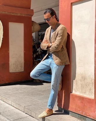 Tan Linen Blazer Outfits For Men: This combo of a tan linen blazer and light blue jeans is solid proof that a pared down look can still be really interesting. If you want to instantly step up this ensemble with footwear, introduce beige canvas loafers to this look.