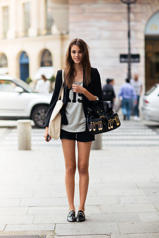 Black Shorts Outfits For Women: Dress in a black blazer and black shorts to pull together a seriously stylish and modern-looking casual outfit. Give an easy-going feel to your look by wearing a pair of black leather derby shoes.