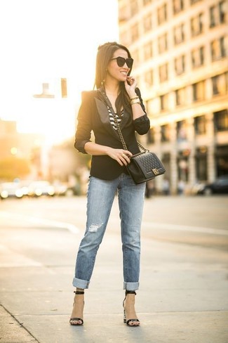 Light Blue Skinny Jeans Outfits: If you're after a laid-back yet seriously chic getup, try teaming a black blazer with light blue skinny jeans. Make this look slightly classier by finishing with black leather heeled sandals.