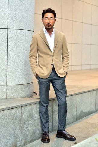 Dark Brown Leather Monks Outfits: You'll be surprised at how easy it is for any gentleman to pull together this casual outfit. Just a tan blazer and navy cargo pants. Complement this outfit with dark brown leather monks to make the ensemble slightly more sophisticated.