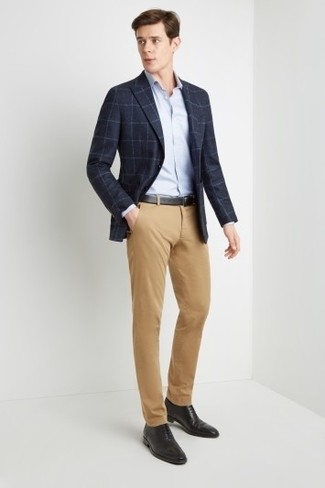 Light Blue Dress Shirt Smart Casual Outfits For Men: Exhibit your styling game by wearing a light blue dress shirt and khaki chinos. Put a more refined spin on this outfit by sporting black leather oxford shoes.