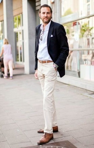 Brown Derby Shoes Outfits: This pairing of a navy blazer and beige chinos is solid proof that a pared down getup doesn't have to be boring. For something more on the elegant end to round off this getup, introduce brown derby shoes to this outfit.