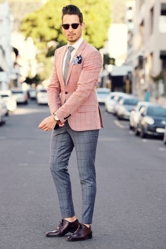 Check Blazer Outfits For Men: Extremely dapper and comfortable, this relaxed pairing of a check blazer and grey check chinos will provide you with variety. If you wish to instantly bump up this ensemble with a pair of shoes, why not complete this outfit with a pair of burgundy leather oxford shoes?