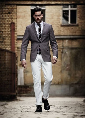 Grey Check Blazer Outfits For Men: Teaming a grey check blazer and white chinos will hallmark your prowess in menswear styling. Rev up this whole outfit by slipping into black leather oxford shoes.