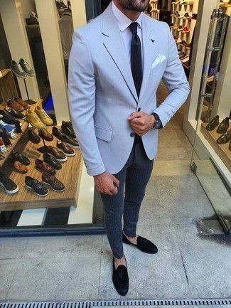 Black Canvas Watch Outfits For Men: For a relaxed ensemble, Go for a light blue blazer and a black canvas watch. Black suede tassel loafers are a simple way to breathe a dash of polish into this getup.